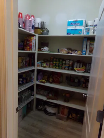 a room with a book shelf