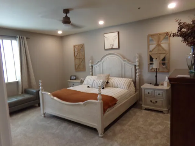 a bed room with a bed and a couch