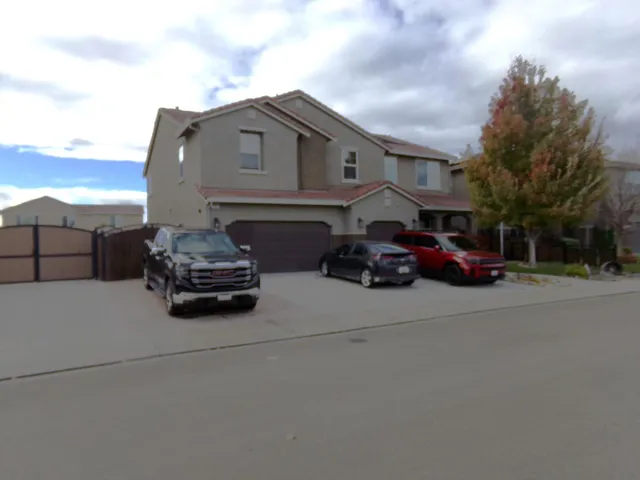 a car parked in front of a house