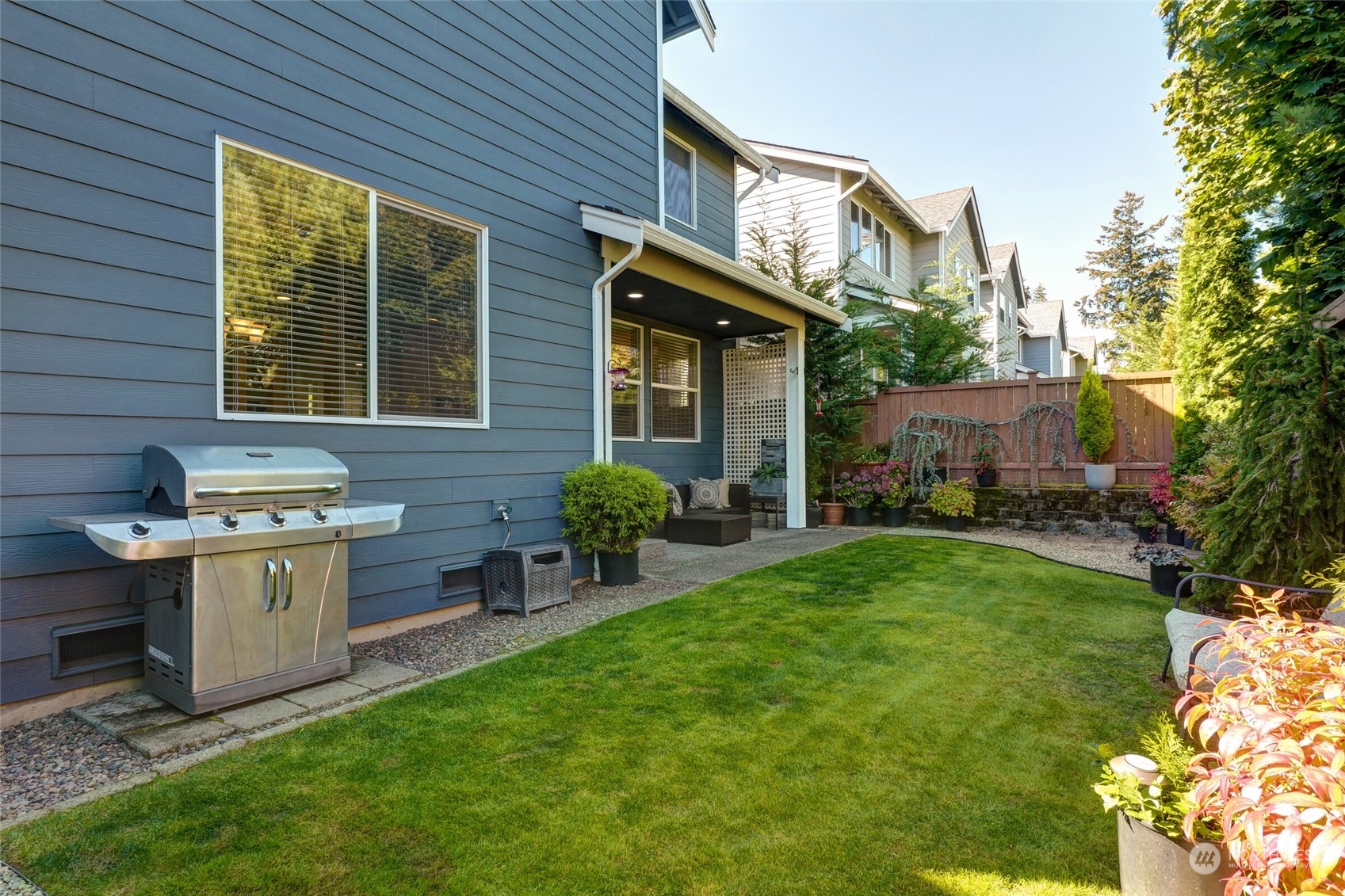 3533 198th Street Southeast Bothell, WA 98012 - Photo 26 of 27 a view of a house with backyard and sitting area