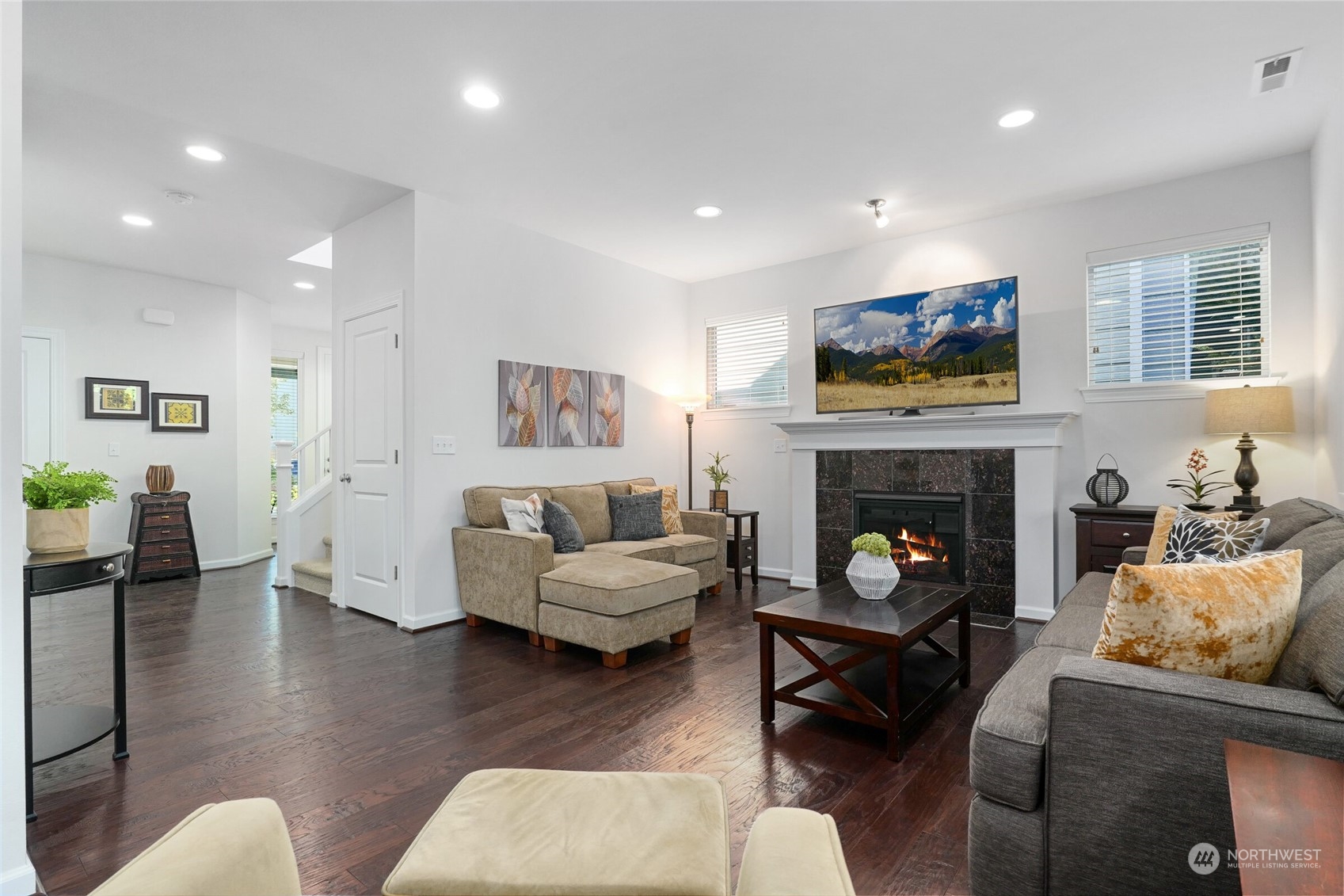 3533 198th Street Southeast Bothell, WA 98012 - Photo 6 of 27 a living room with furniture and a fireplace