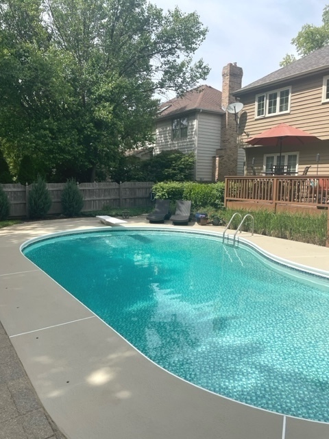 912 West Bailey Road Naperville, IL 60565 - Photo 14 of 16 a view of a house with a yard and a fence