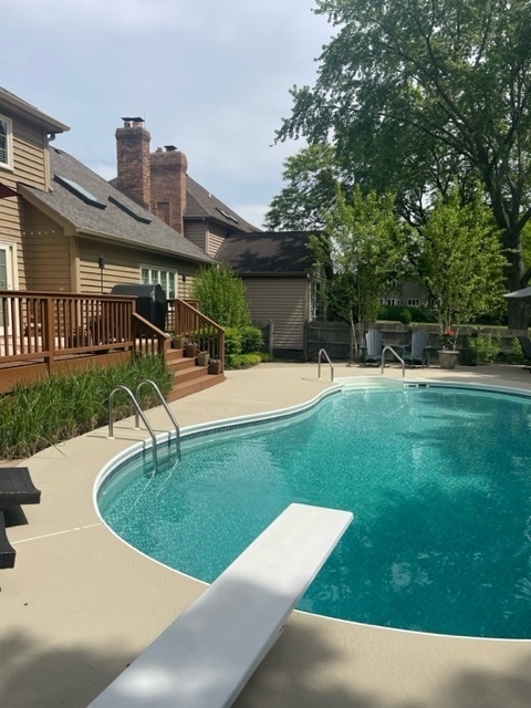 912 West Bailey Road Naperville, IL 60565 - Photo 15 of 16 a view of a house with a backyard