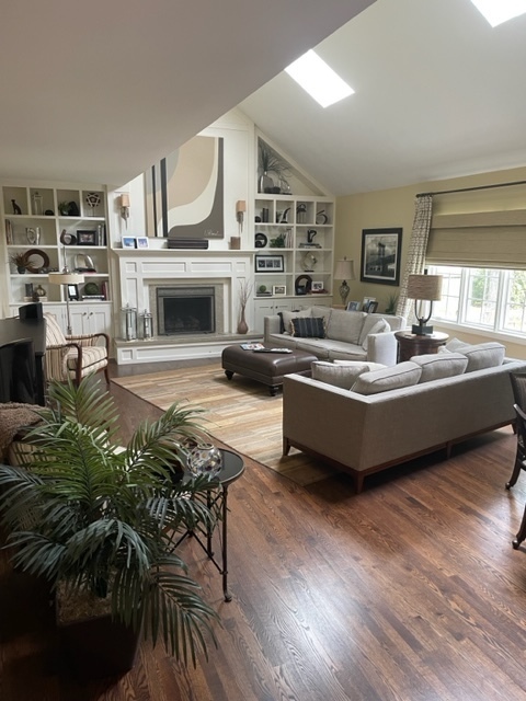 912 West Bailey Road Naperville, IL 60565 - Photo 3 of 16 a living room with furniture a fireplace and a large window