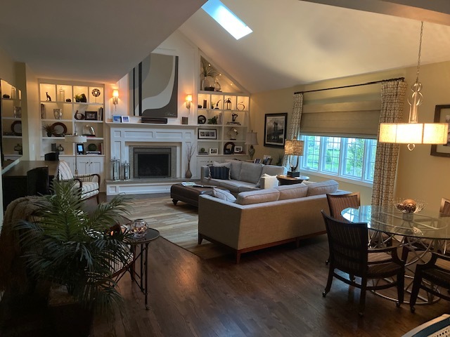 912 West Bailey Road Naperville, IL 60565 - Photo 6 of 16 a living room with furniture a fireplace and a floor to ceiling window