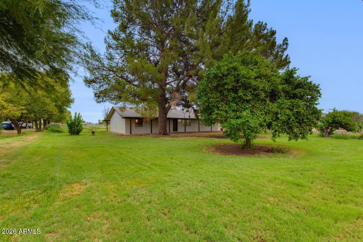 7101 North Perryville Road Waddell, AZ 85355 - Photo 52 of 66 7101 N Perryville driveway 5