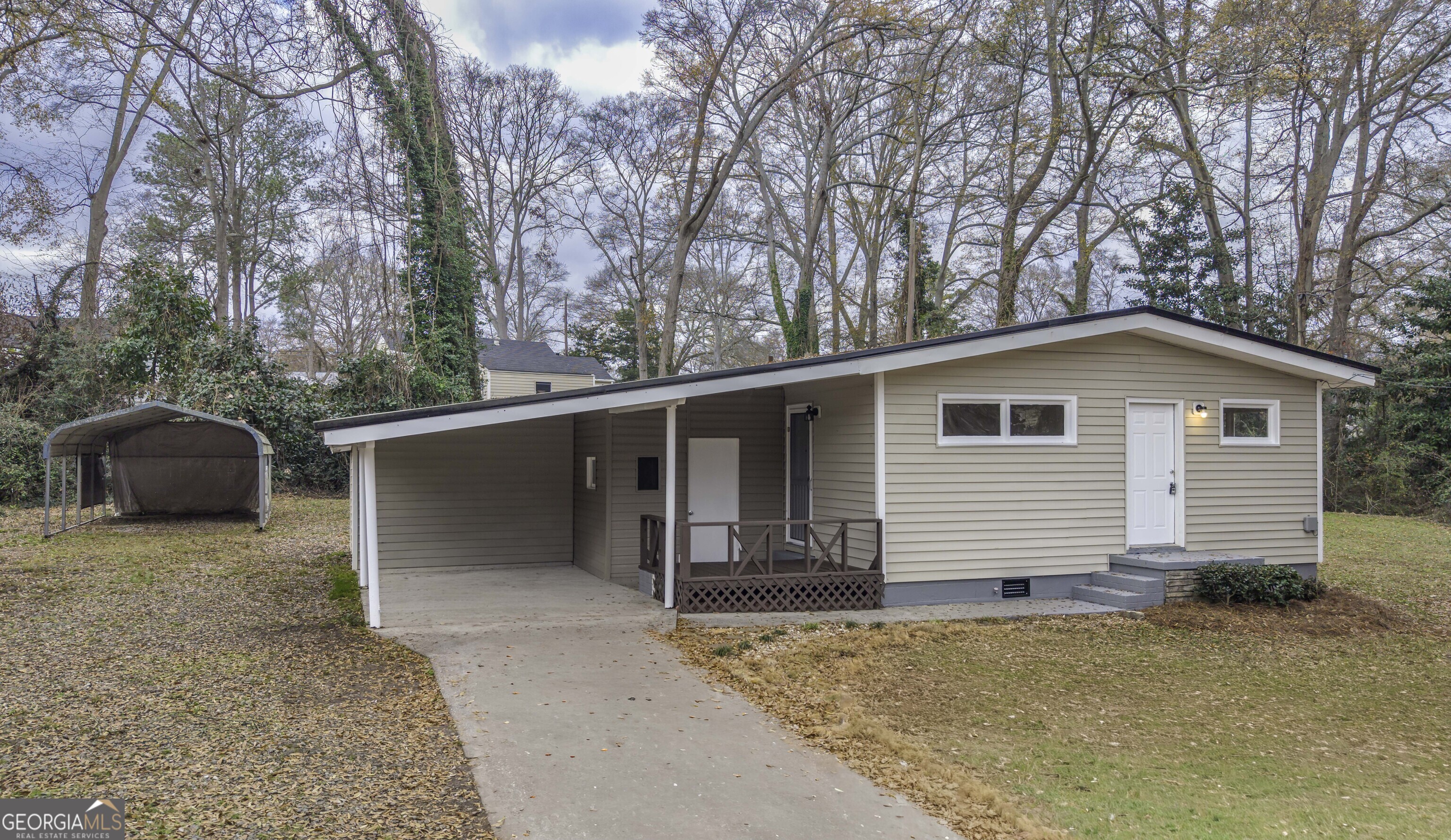 208 Richards Street Carrollton, GA 30117 - Photo 2 of 42 a view of backyard of house