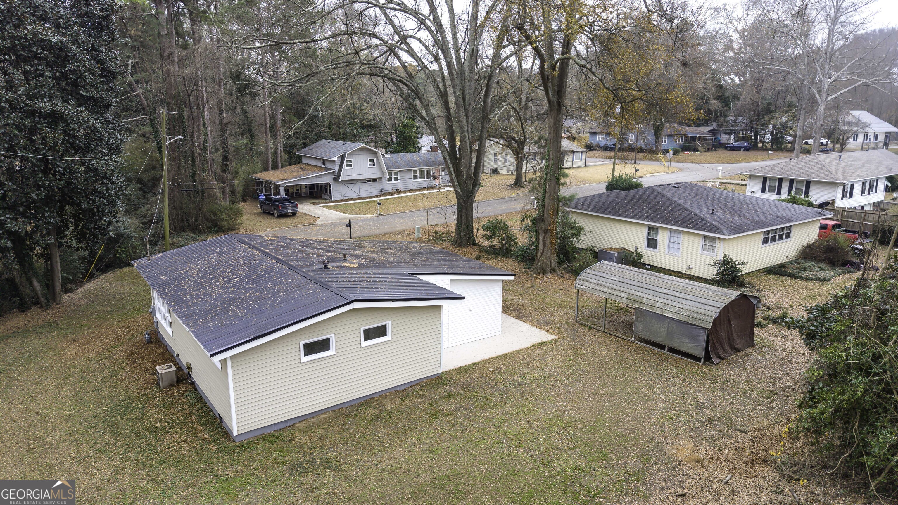 208 Richards Street Carrollton, GA 30117 - Photo 3 of 42 a view of a patio with a yard