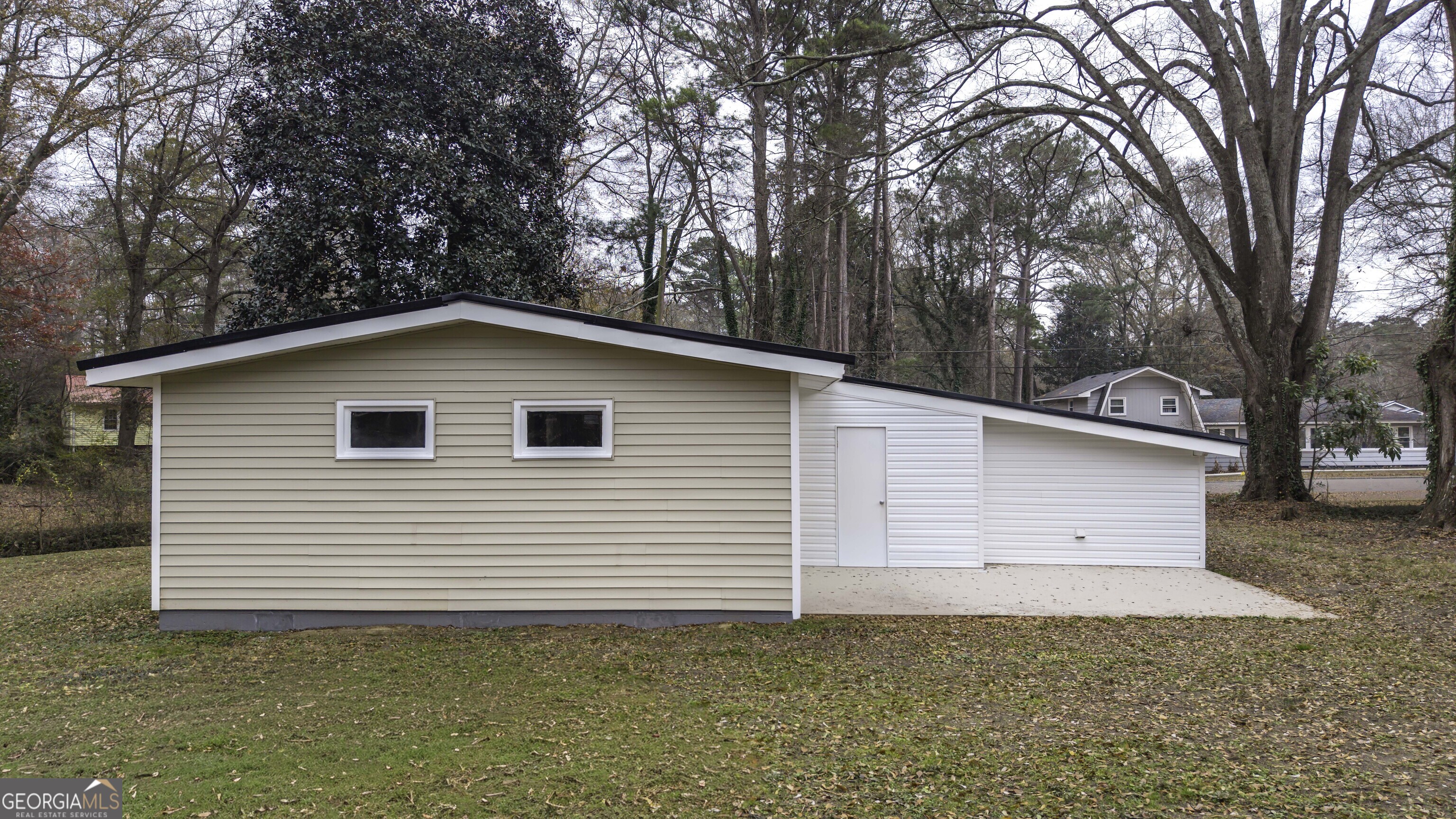 208 Richards Street Carrollton, GA 30117 - Photo 4 of 42 a view of a backyard