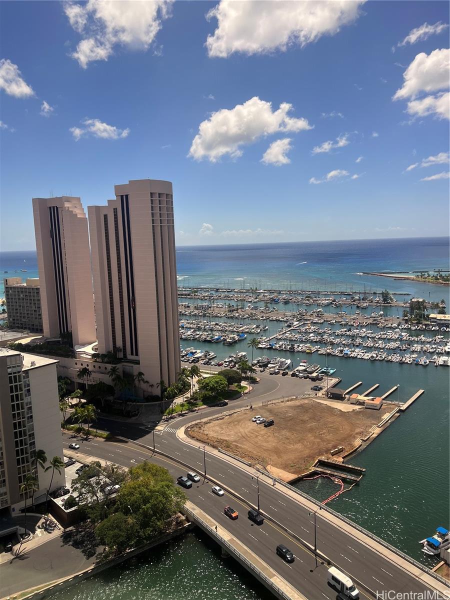 1650 Ala Moana Boulevard, Unit 3107 Honolulu, HI 96815 - Photo 20 of 22 a view of a terrace with sitting area