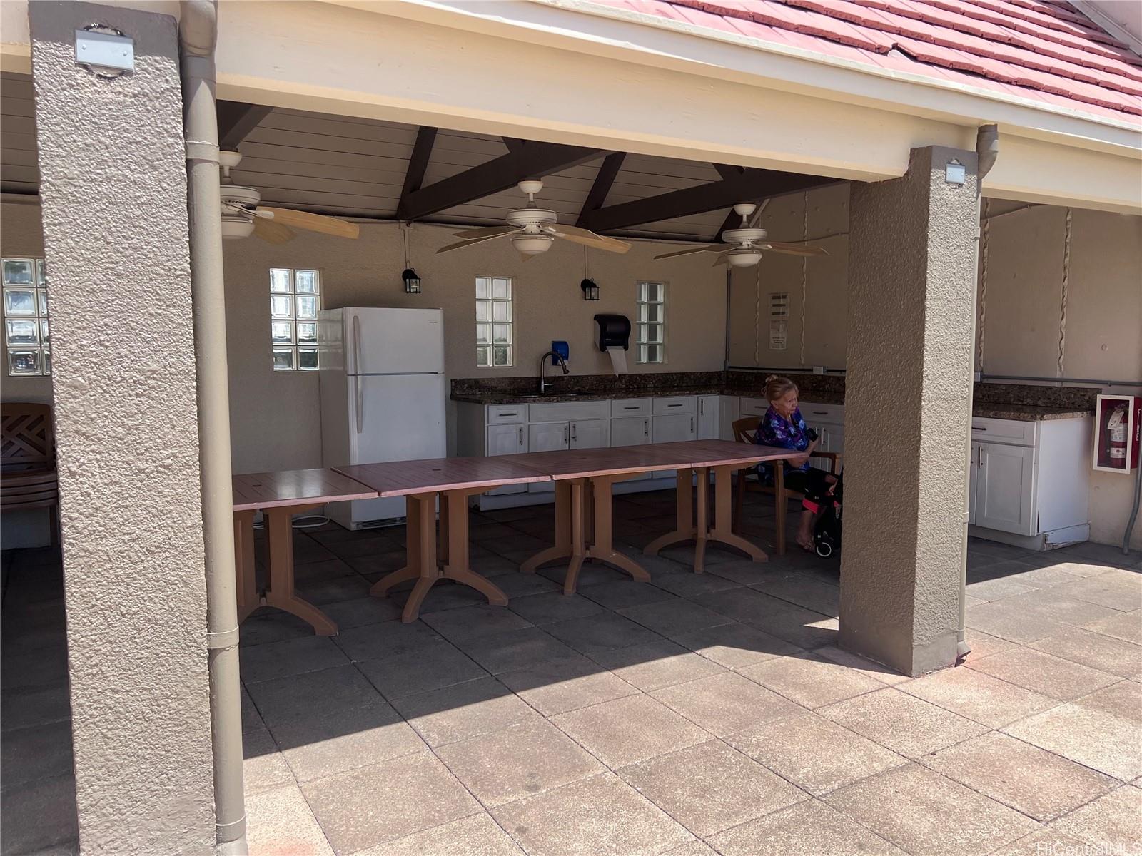1650 Ala Moana Boulevard, Unit 3107 Honolulu, HI 96815 - Photo 8 of 22 a view of a chairs and table in a room