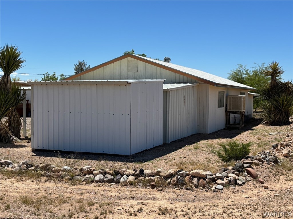 3565 Ehrenberg Road Golden Valley, AZ 86413 - Photo 16 of 63 a backyard of a house