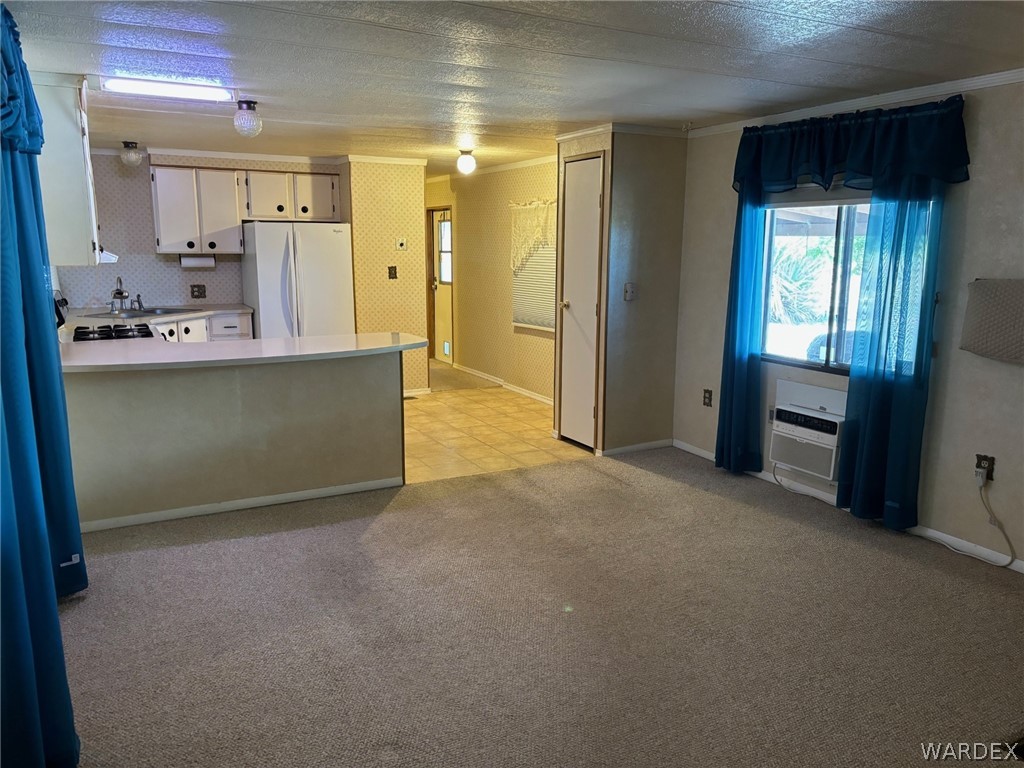 3565 Ehrenberg Road Golden Valley, AZ 86413 - Photo 26 of 63 a view of kitchen with windows
