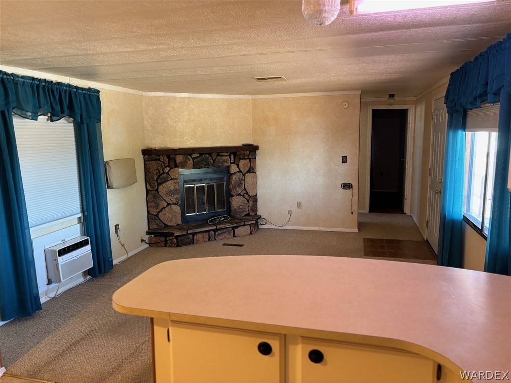 3565 Ehrenberg Road Golden Valley, AZ 86413 - Photo 29 of 63 a room with a table and chairs