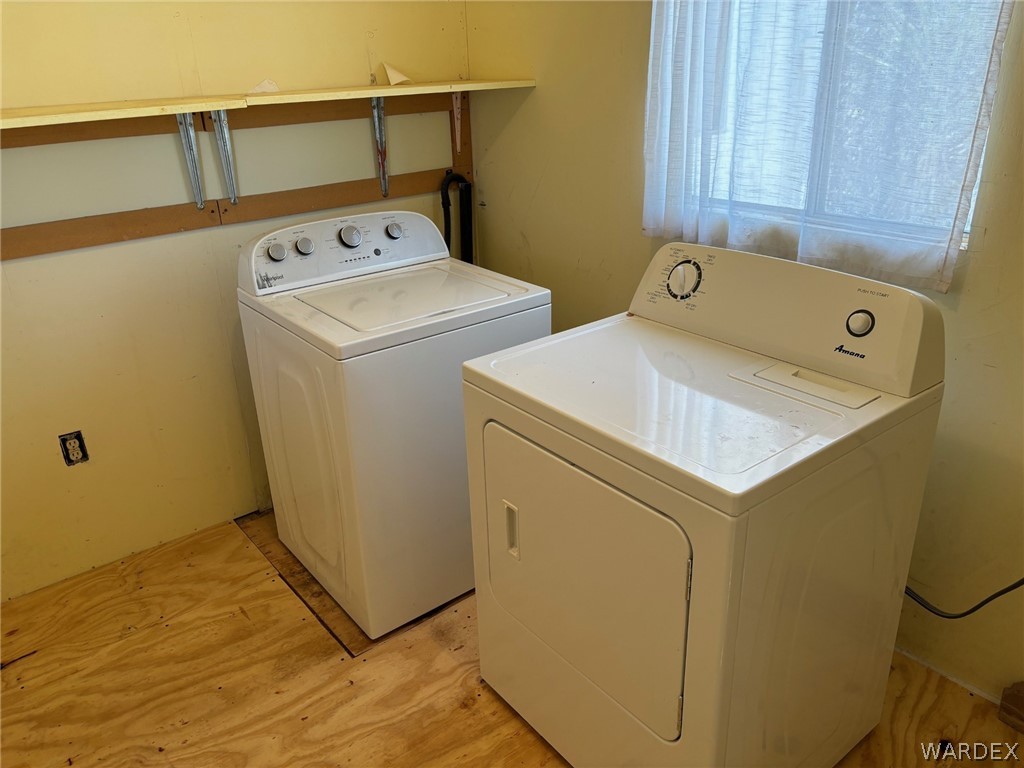 3565 Ehrenberg Road Golden Valley, AZ 86413 - Photo 36 of 63 a utility room with dryer and washer