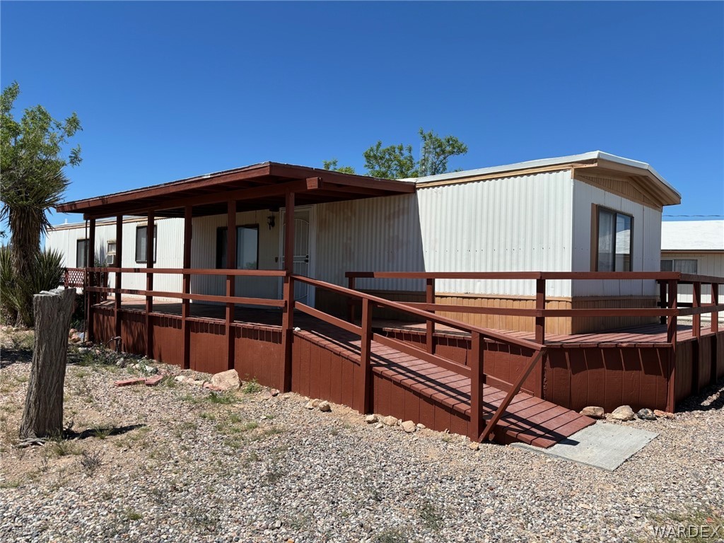 3565 Ehrenberg Road Golden Valley, AZ 86413 - Photo 6 of 63 a house view with a outdoor space
