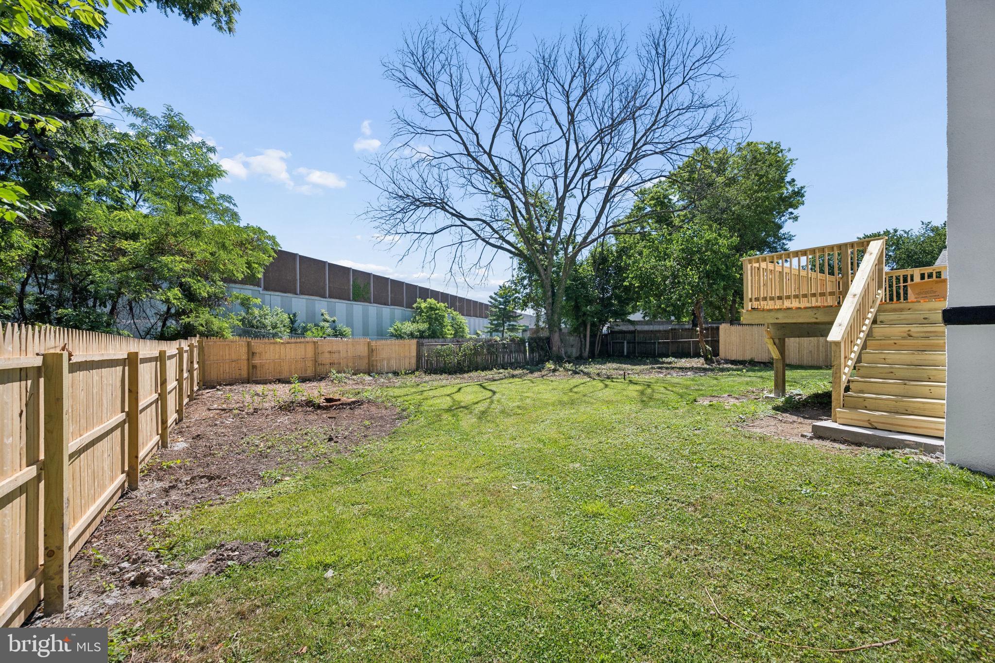 517 Valcour Road Baltimore, MD 21228 - Photo 41 of 47 a view of a backyard with a garden