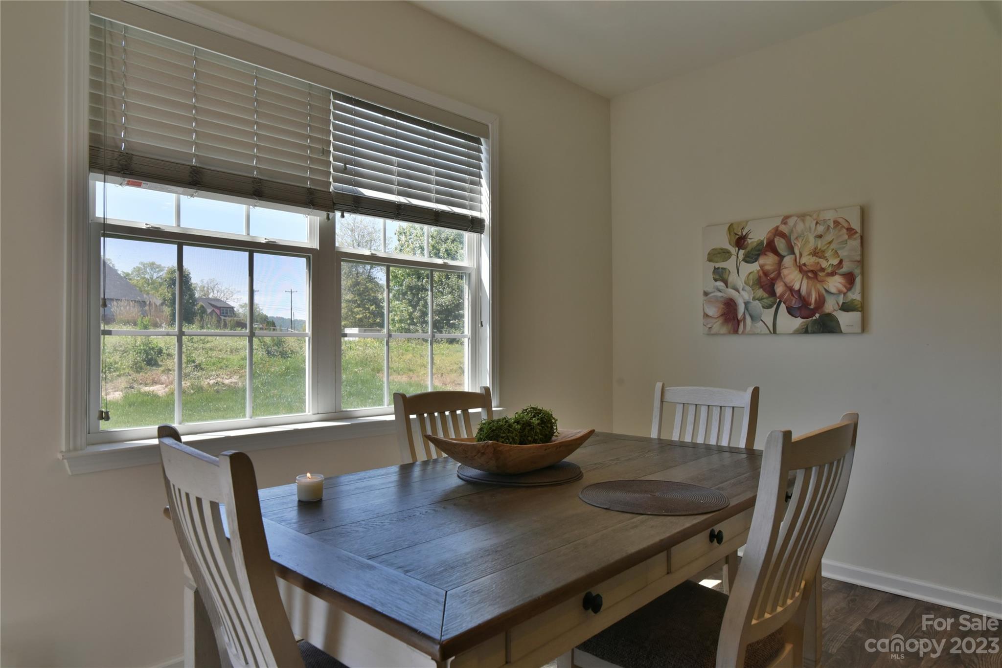 18 Yadkin Road Fletcher, NC 28732 - Photo 11 of 25 a view of a dining room with furniture and window