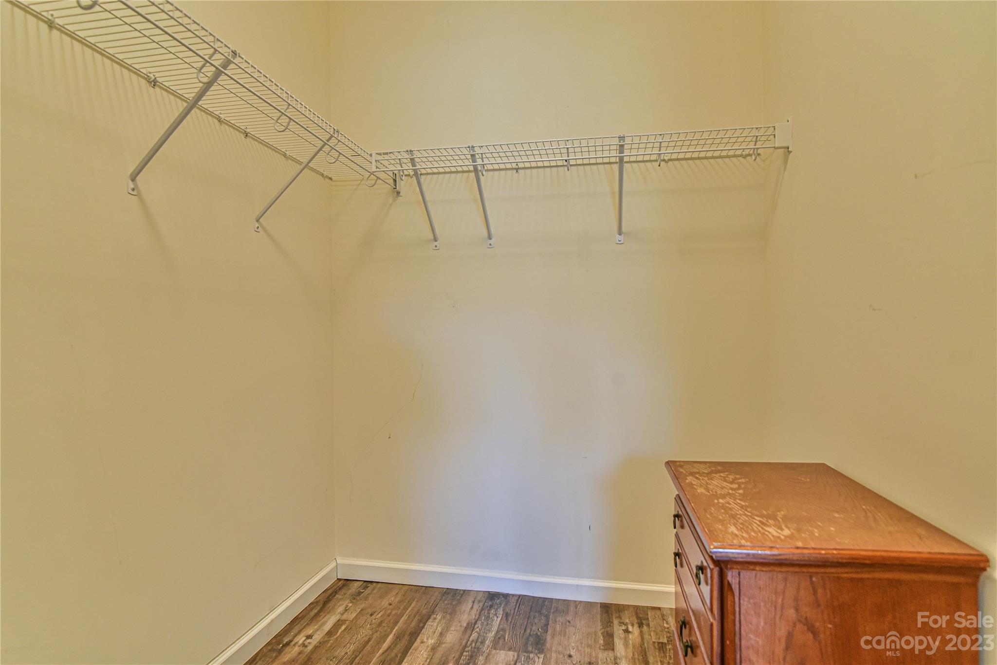 18 Yadkin Road Fletcher, NC 28732 - Photo 17 of 25 a view of a room with racks on the wall
