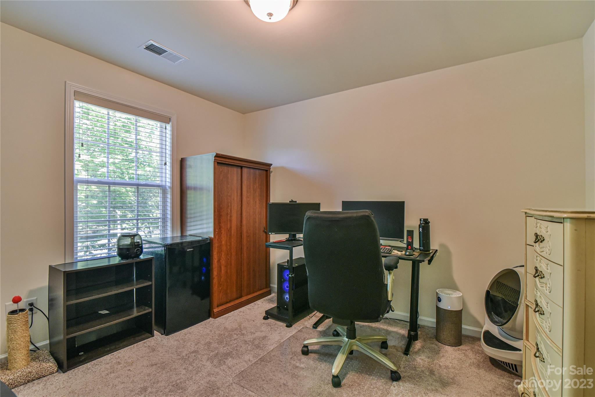 18 Yadkin Road Fletcher, NC 28732 - Photo 19 of 25 a view of a workspace with furniture and a window