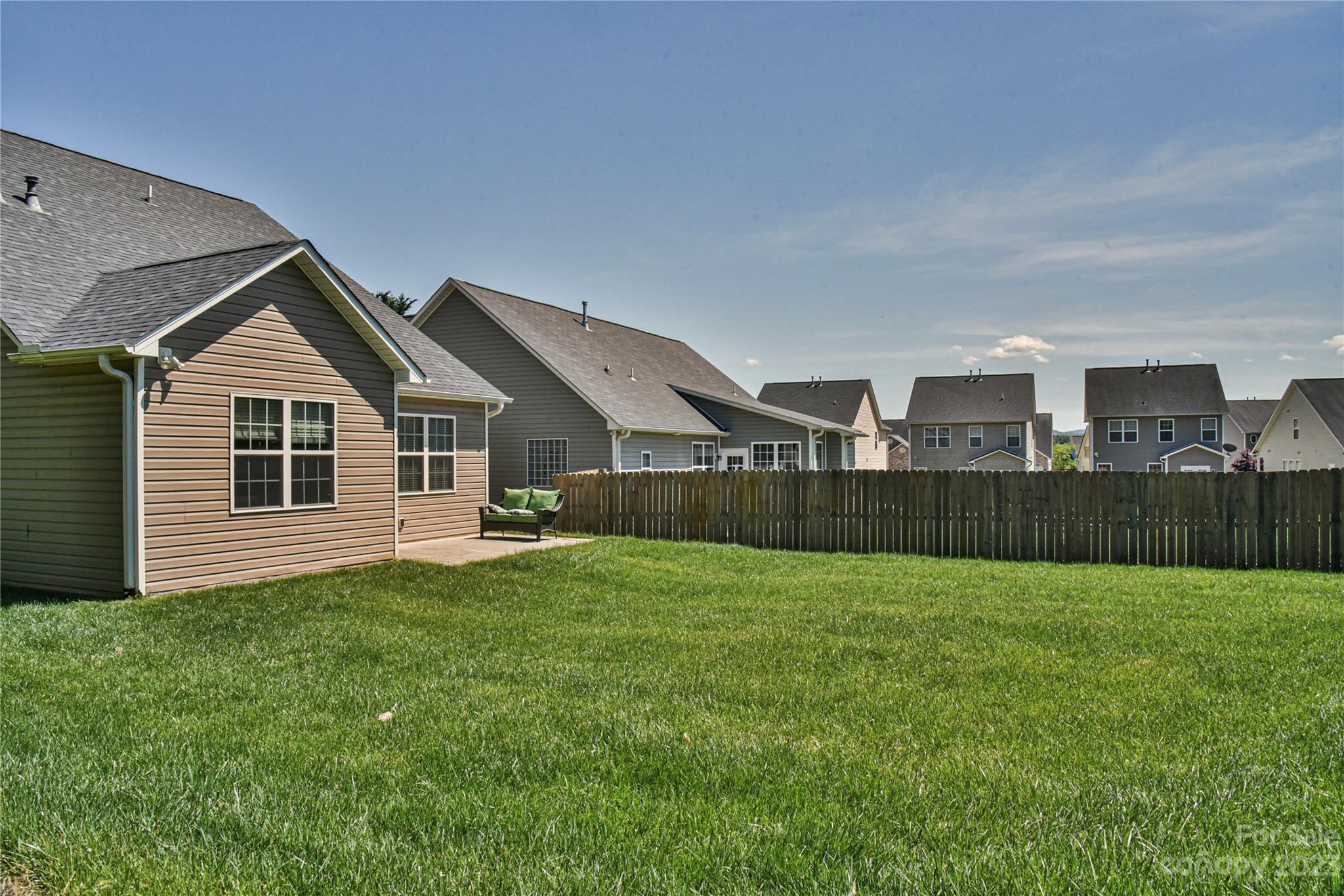 18 Yadkin Road Fletcher, NC 28732 - Photo 3 of 25 a front view of a house with a yard