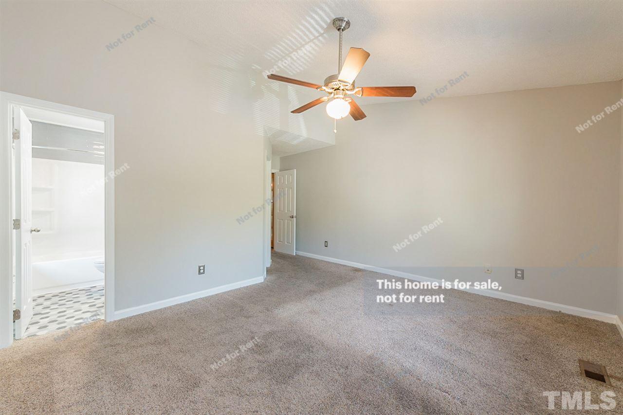 2412 Calvert Drive Raleigh, NC 27610 - Photo 11 of 19 an empty room