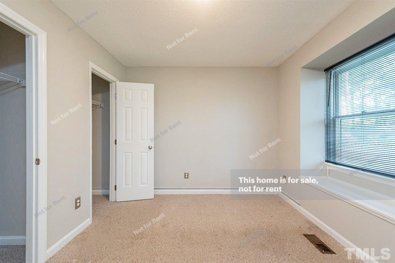 2412 Calvert Drive Raleigh, NC 27610 - Photo 15 of 19 a view of an empty room with a window