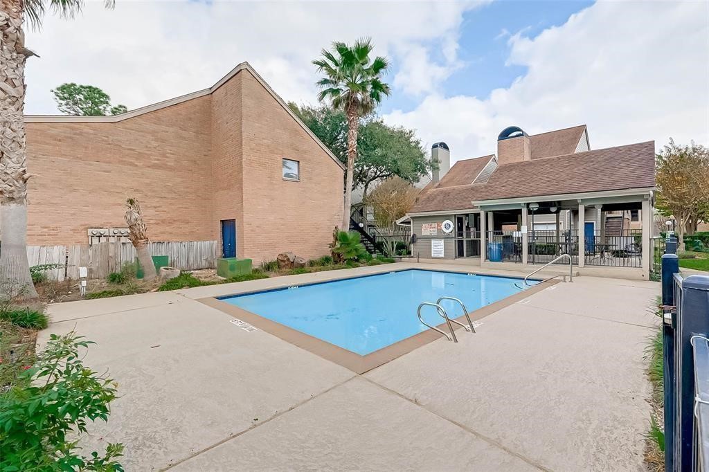 6601 Sands Point Drive, Unit 34 Houston, TX 77074 - Photo 24 of 24 a view of house with outdoor space and swimming pool