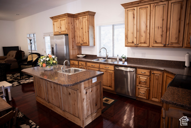 2855 South 1000 West Perry, UT 84302 - Photo 142 of 142 ADU - Kitchen with appliances with stainless steel finishes, an island with sink, dark wood-type flooring, an open floor plan, and a kitchen bar