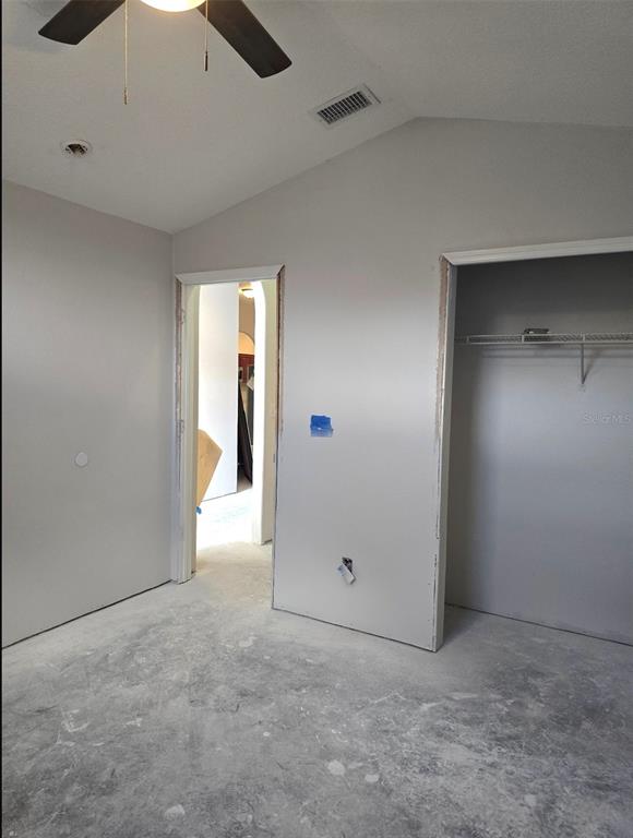 8640 Hawbuck Street Trinity, FL 34655 - Photo 17 of 33 an empty room with closet