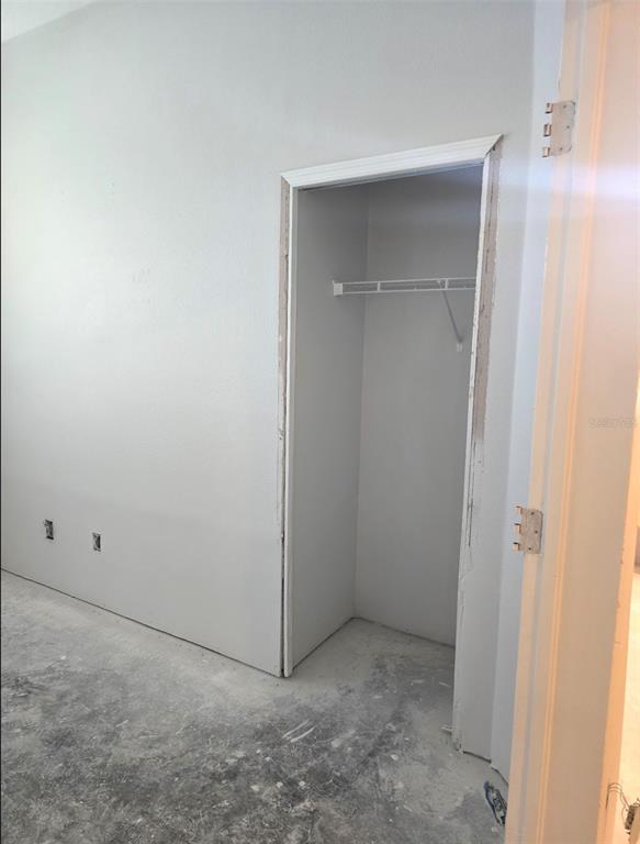 8640 Hawbuck Street Trinity, FL 34655 - Photo 18 of 33 a view of an empty room