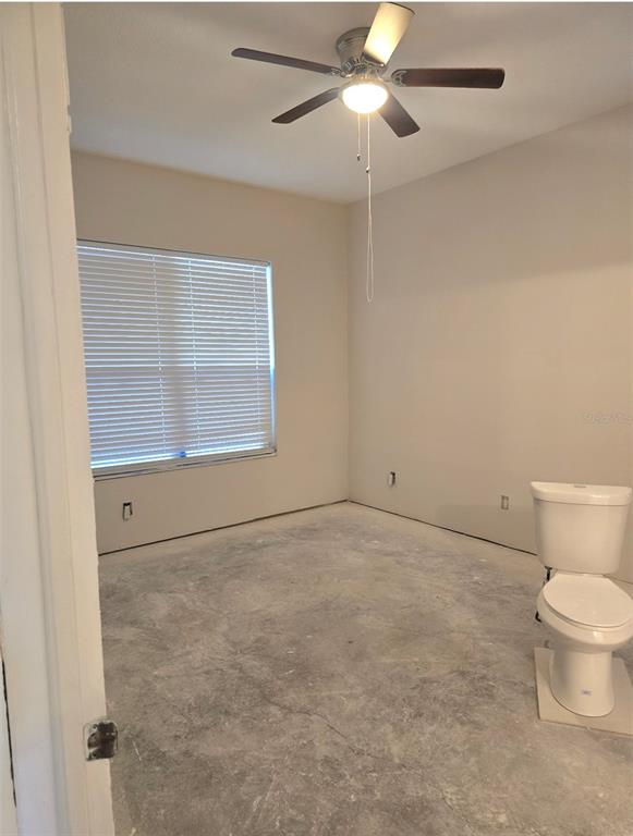 8640 Hawbuck Street Trinity, FL 34655 - Photo 20 of 33 a view of an empty room with a window