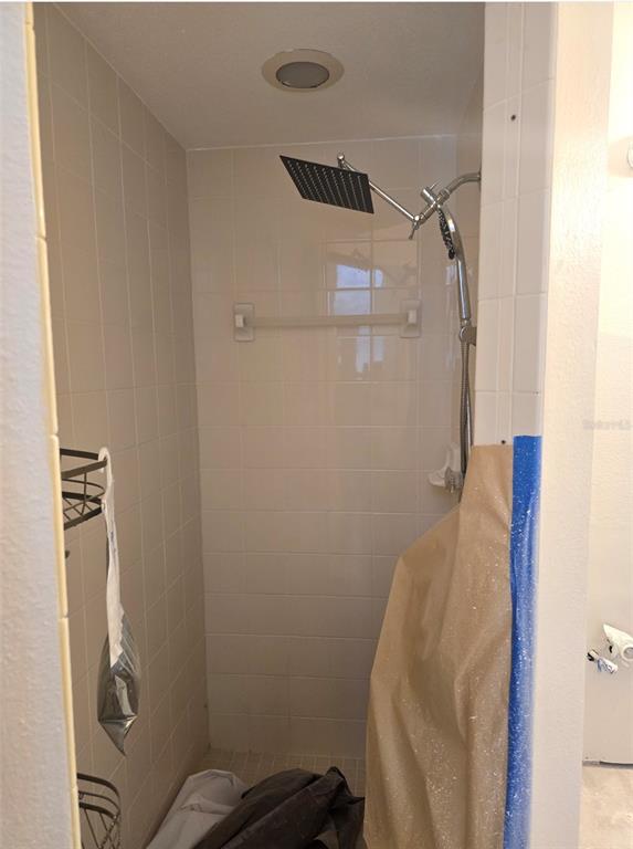 8640 Hawbuck Street Trinity, FL 34655 - Photo 24 of 33 a bathroom with a sink and toilet