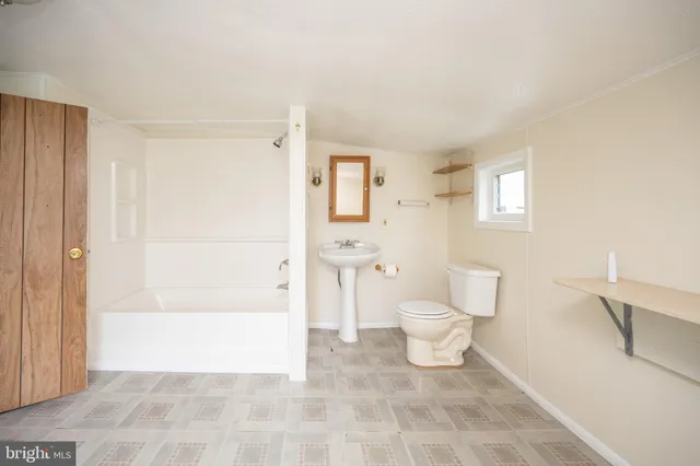 a view of storage and utility room