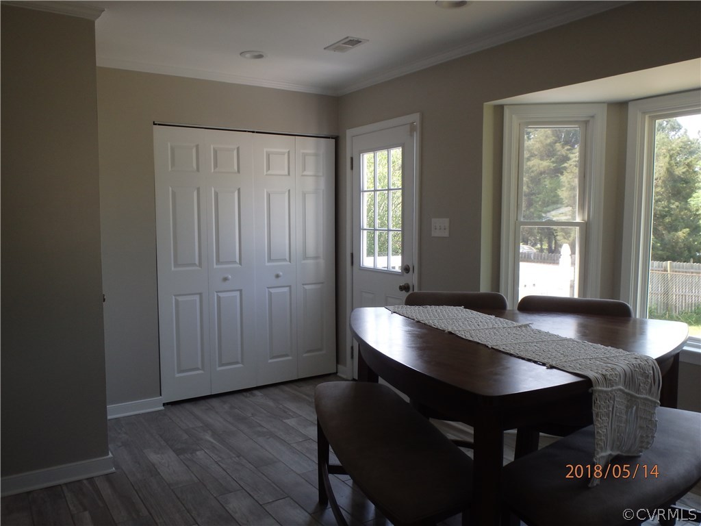 5036 Alberta Road Chesterfield, VA 23832 - Photo 12 of 20 a view of a dining room with furniture and window