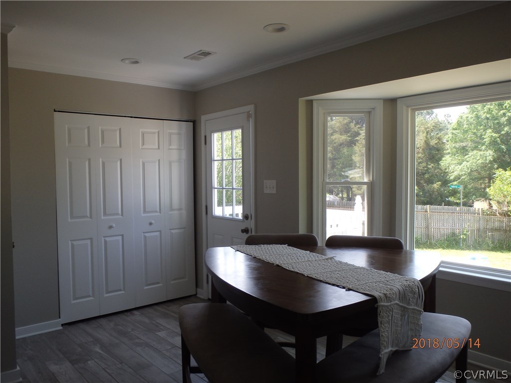 5036 Alberta Road Chesterfield, VA 23832 - Photo 13 of 20 a view of a room with a window and wooden floor