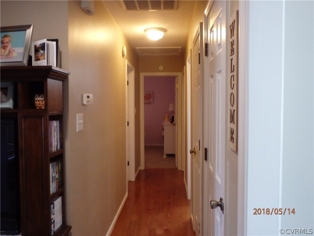 5036 Alberta Road Chesterfield, VA 23832 - Photo 16 of 20 a view of a hallway with wooden floor