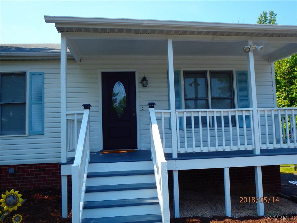 5036 Alberta Road Chesterfield, VA 23832 - Photo 2 of 20 a view of a chair with a table and chair
