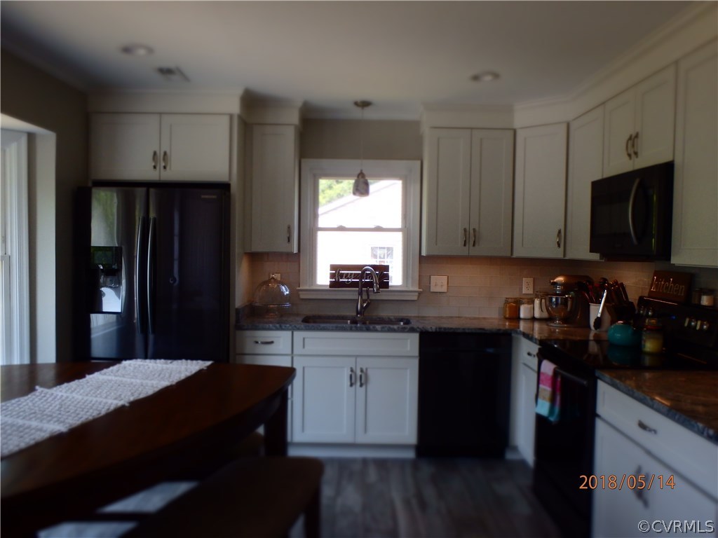 5036 Alberta Road Chesterfield, VA 23832 - Photo 9 of 20 a kitchen with a sink stove top oven and refrigerator