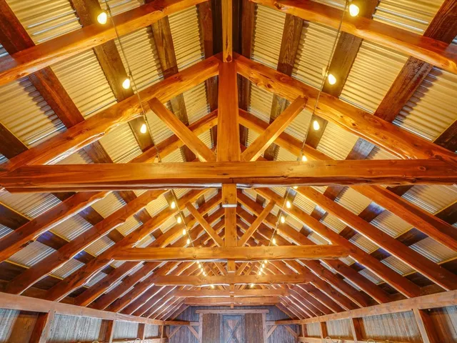 a view of a swimming pool with outdoor seating