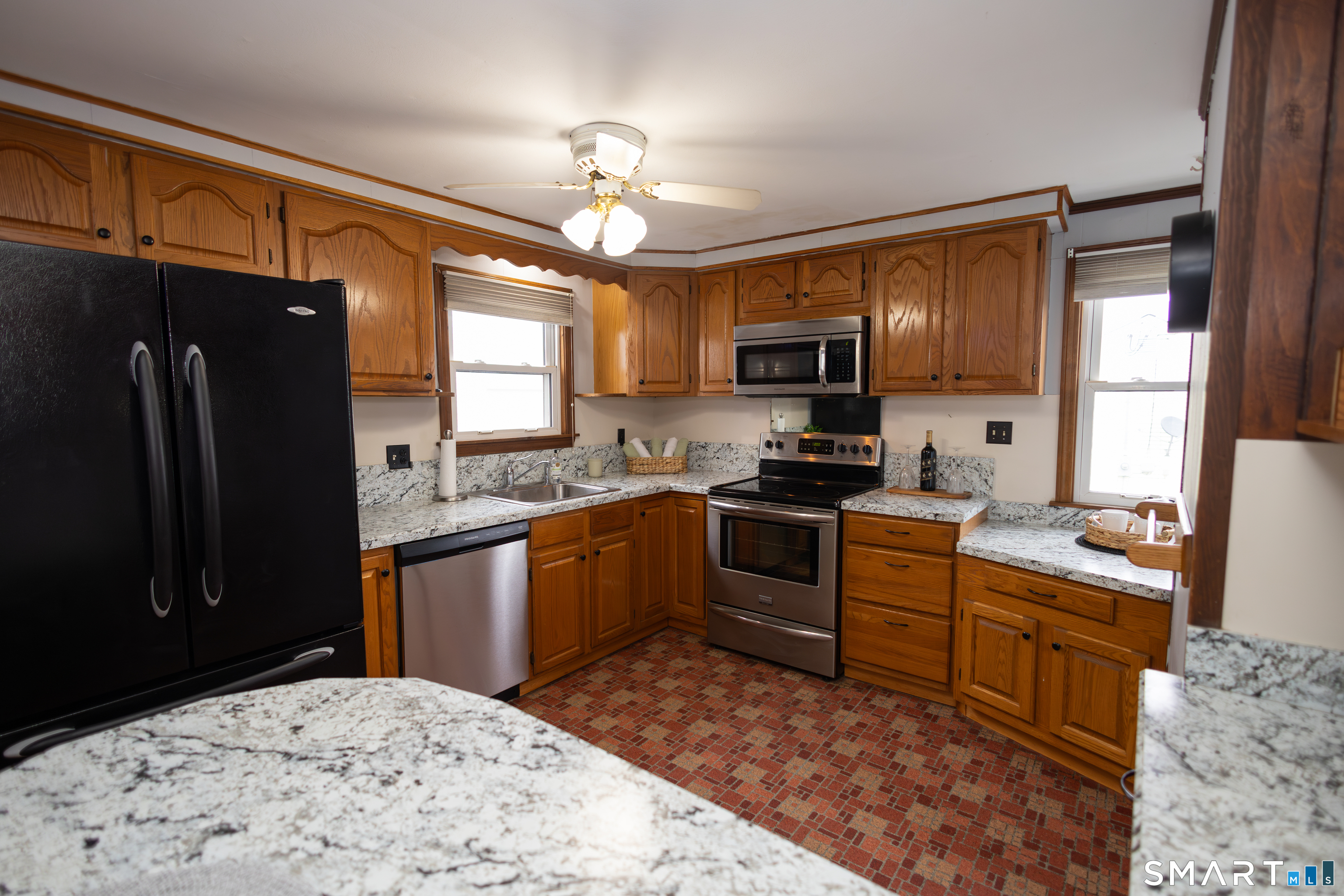 83 Little Fawn Road Southington, CT 06489 - Photo 10 of 40 Great kitchen with breakfast bar and tons of cabinets