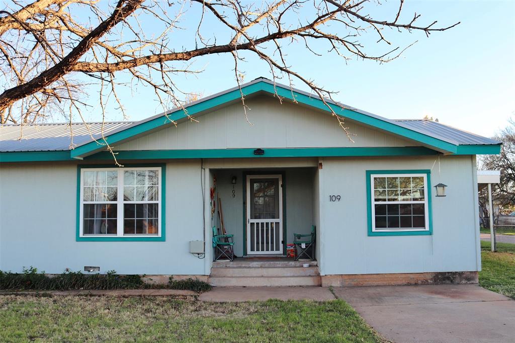 109 Novice Road Winters, TX 79567 - Photo 18 of 32 a front view of a house with garden