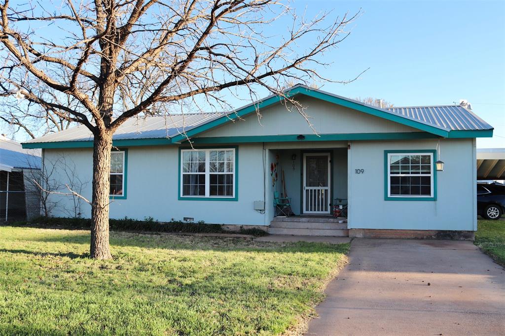 109 Novice Road Winters, TX 79567 - Photo 2 of 32 a house with trees in the background