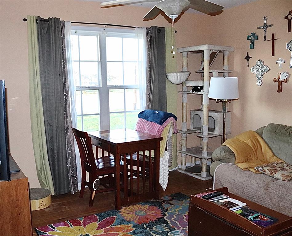 109 Novice Road Winters, TX 79567 - Photo 28 of 32 a dining room with furniture and wooden floor