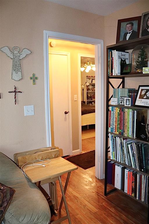 109 Novice Road Winters, TX 79567 - Photo 29 of 32 a view of a bedroom with furniture and book shelf