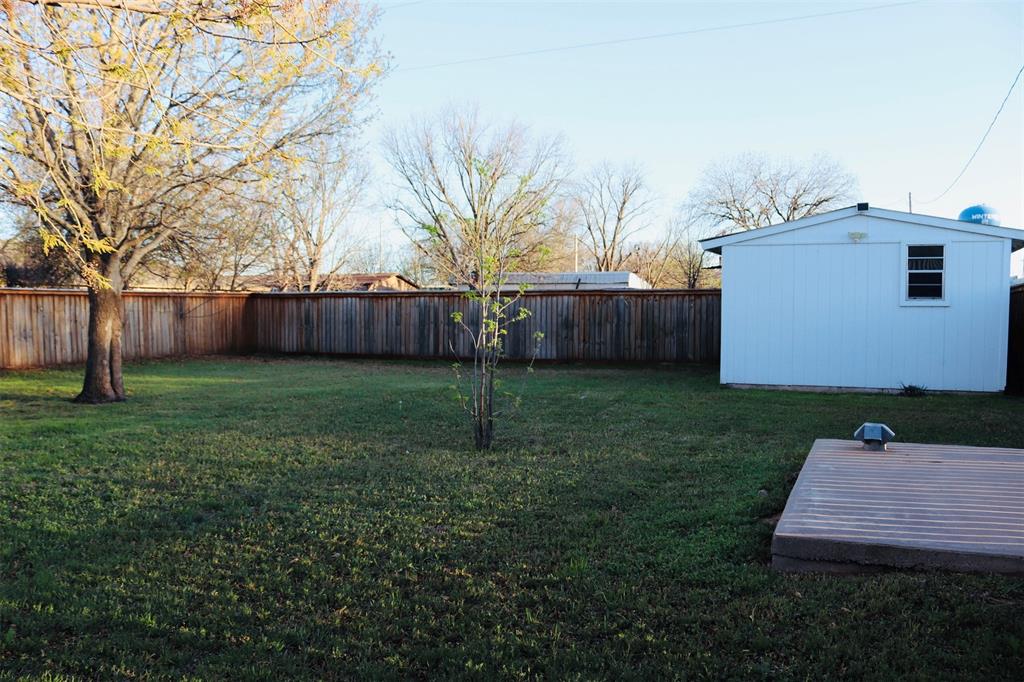 109 Novice Road Winters, TX 79567 - Photo 10 of 32 a view of a backyard with a house