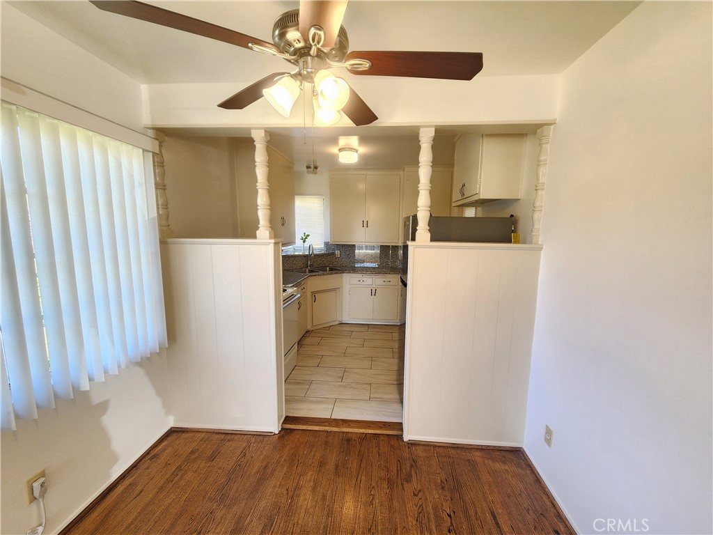 21 West Newman Avenue Arcadia, CA 91007 - Photo 12 of 29 a view of a kitchen with wooden floor and a ceiling fan