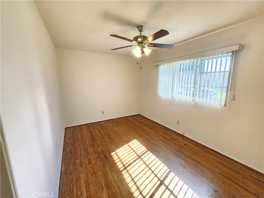 21 West Newman Avenue Arcadia, CA 91007 - Photo 24 of 29 a view of empty room with wooden floor and fan