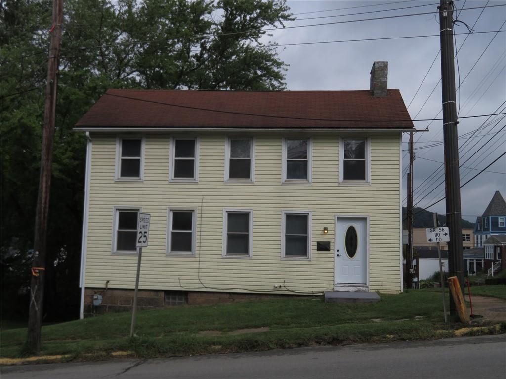 326 1st Street Apollo, PA 15613 - Photo 2 of 17 a front view of a house with a yard