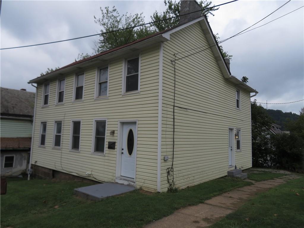 326 1st Street Apollo, PA 15613 - Photo 16 of 17 a view of a house with a yard